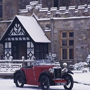 1930 MG M type in snow at Palace House, Beaulieu