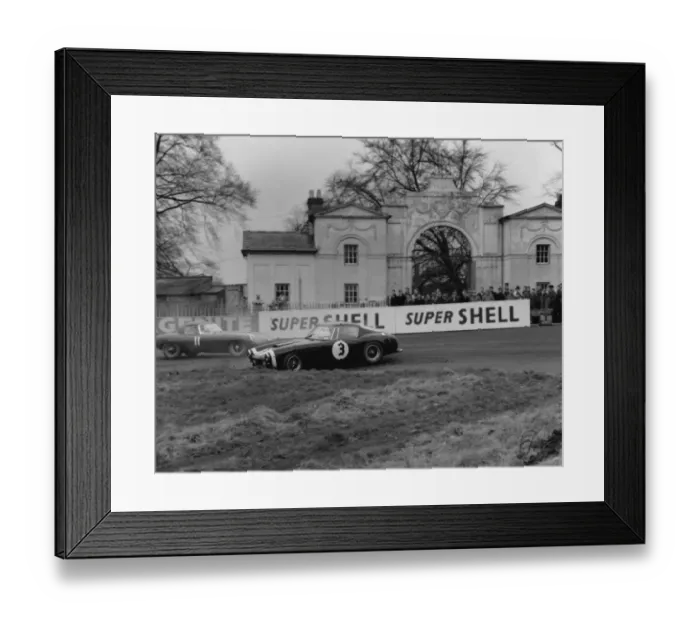 Framed Print : Ferrari 250 SWB spins as Jaguar E type passes