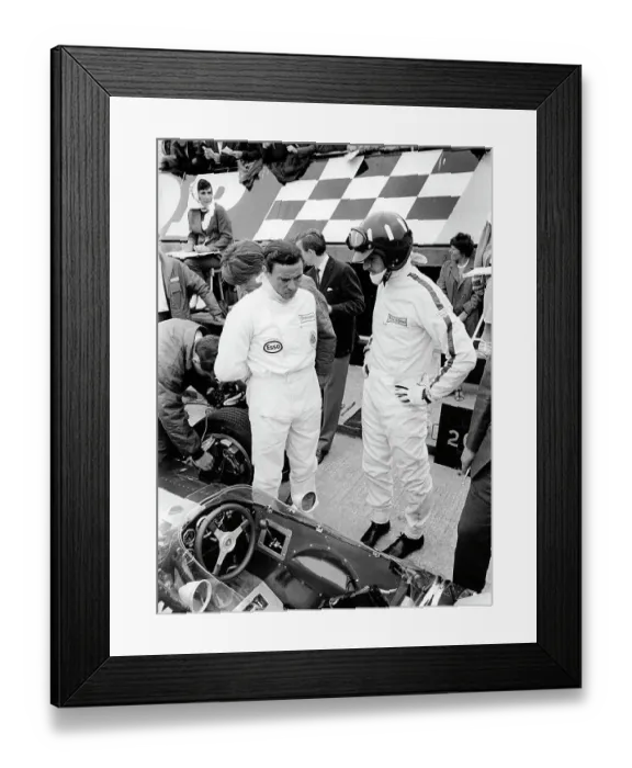 Framed Print : Jim Clark and Graham Hill with Lotus 49 during 1967 British Grand Prix