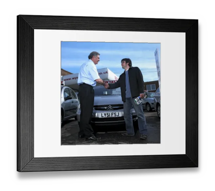 Framed Print : A car salesman