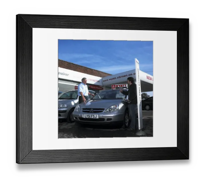 Framed Print : A car salesman