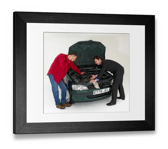 Framed Print : Car salesman showing customer under the bonnet Framed Print : Car salesman showing customer under the bonnet