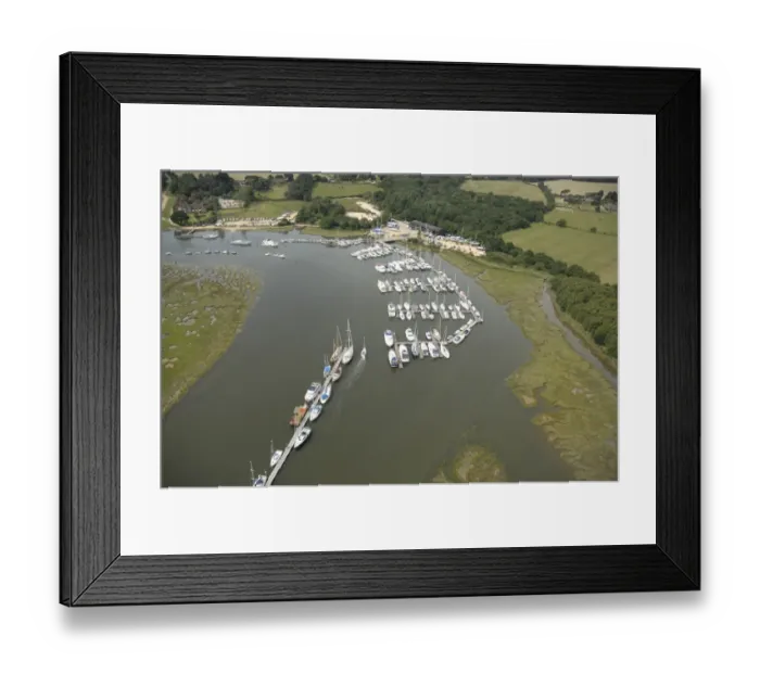 Framed Print : Beaulieu River Aerial view showing marina at Bucklers Hard Framed Print : Beaulieu River Aerial view showing marina at Bucklers Hard