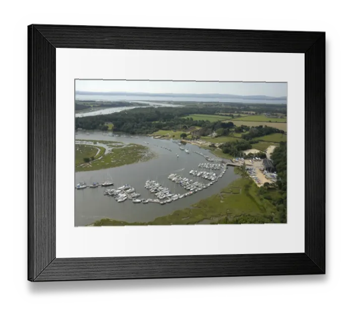 Framed Print : Beaulieu River Aerial view showing marina at Bucklers Hard Framed Print : Beaulieu River Aerial view showing marina at Bucklers Hard