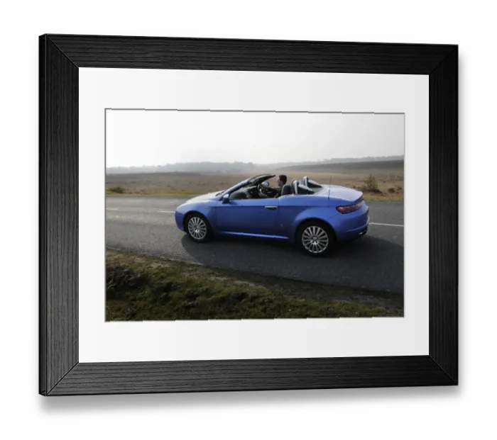 Framed Print : 2006 Alfa Romeo Spyder driving in New Forest Framed Print : 2006 Alfa Romeo Spyder driving in New Forest