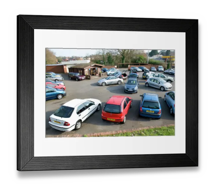 Framed Print : Used Car Dealership
