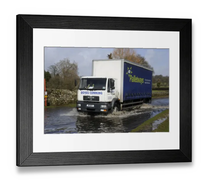 Framed Print : Lorry driving on flooded road Framed Print : Lorry driving on flooded road