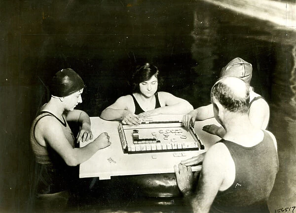 People playing Mahjong by swimming pool, USA