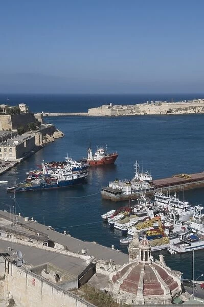 View of the Grand Harbour with fishing boats taken from Barracca Gardens