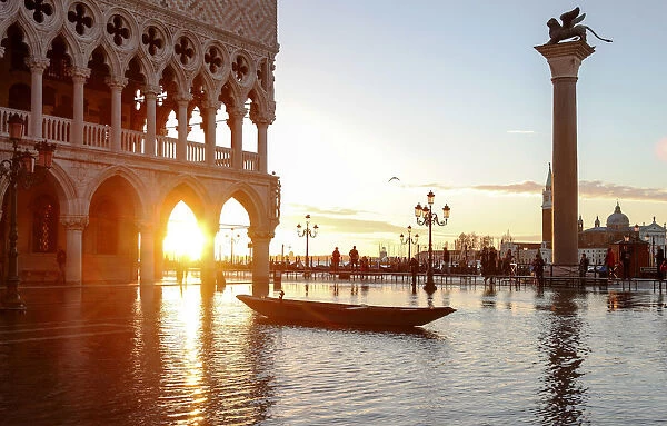 Gondola during High Water (Acqua alta) in St Marks square, Piazzetta, Venice, Veneto
