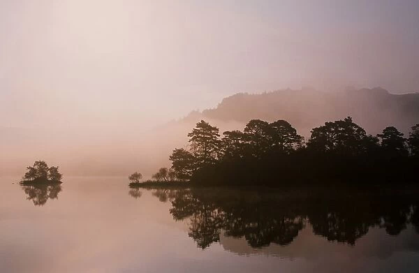 Rydal water and autumn mist in the Lake district UK