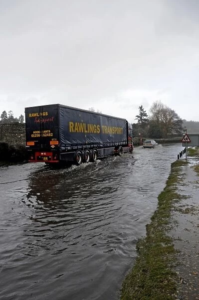 Articulated Lorry driving on flooded road