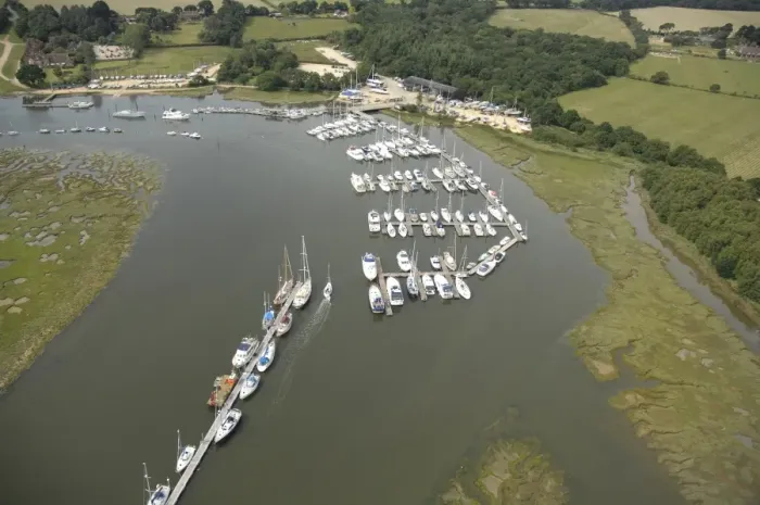 Framed Print : Beaulieu River Aerial view showing marina at Bucklers Hard Framed Print : Beaulieu River Aerial view showing marina at Bucklers Hard