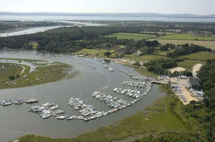 Framed Print : Beaulieu River Aerial view showing marina at Bucklers Hard Framed Print : Beaulieu River Aerial view showing marina at Bucklers Hard