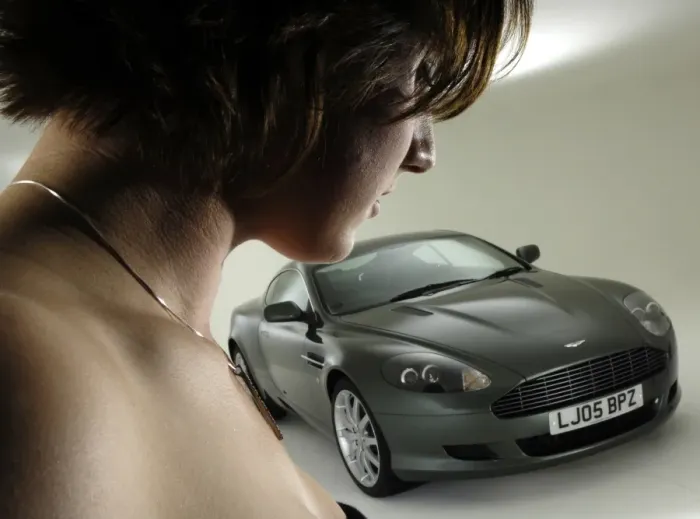 Framed Print : Female Model with 2005 Aston Martin DB9