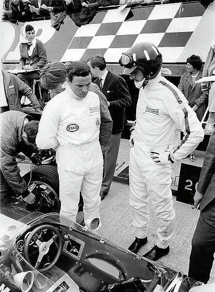 Jim Clark and Graham Hill with Lotus 49 during 1967 British Grand Prix