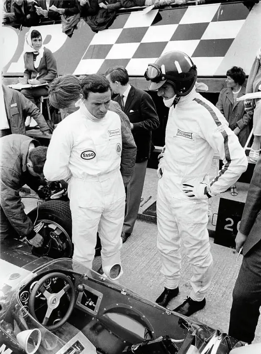 Framed Print : Jim Clark and Graham Hill with Lotus 49 during 1967 British Grand Prix