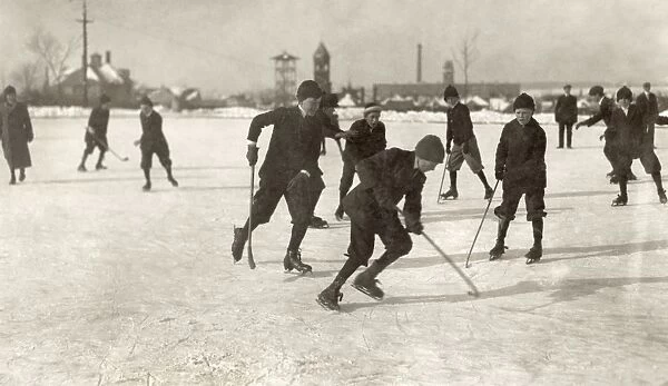 A group of young textile mill boys playing ice hockey on a Sunday morning on Park Pond in New Bedford, Massachusetts. Photograph by Lewis Hine, January 1912