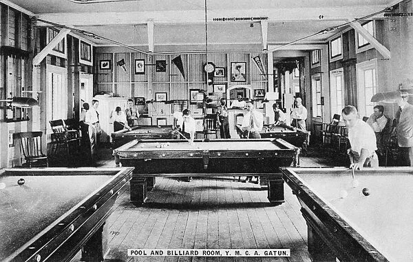 The pool and billiard room at the Gatun Y. M. C. A. in the Panama Canal Zone, built for American civilian workers. Photograph by Thomas J. Marine, c1910
