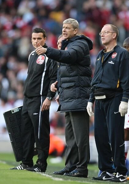 Arsenal manager Arsene Wenger and club doctor Ian Beasley