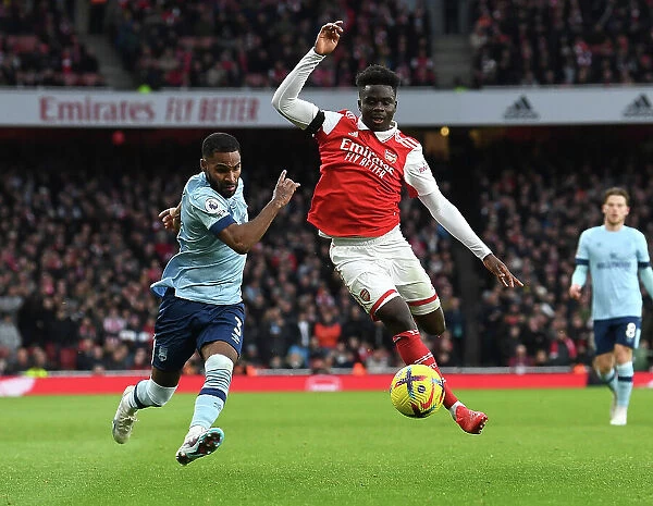 Arsenal vs Brentford: Bukayo Saka Faces Off Against Rico Henry