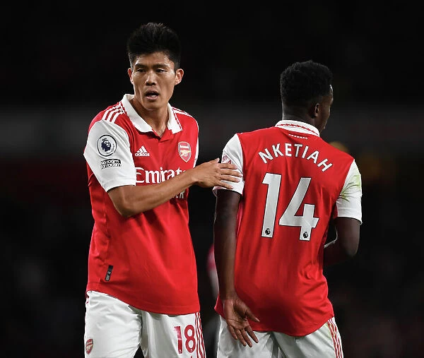 Arsenal's Tomiyasu and Nketiah in Action against Aston Villa, 2022-23 Premier League