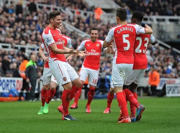 Giroud, Gabriel, and Welbeck Celebrate Arsenal's Victory over Newcastle United in the Premier League (2014 / 15)