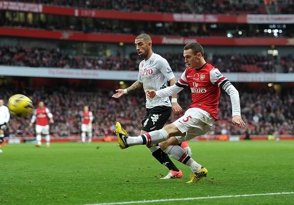 Thomas Vermaelen (Arsenal) Ashkan Dejagah (Fulham). Arsenal 3: 3 Fulham. Barclays Premier League