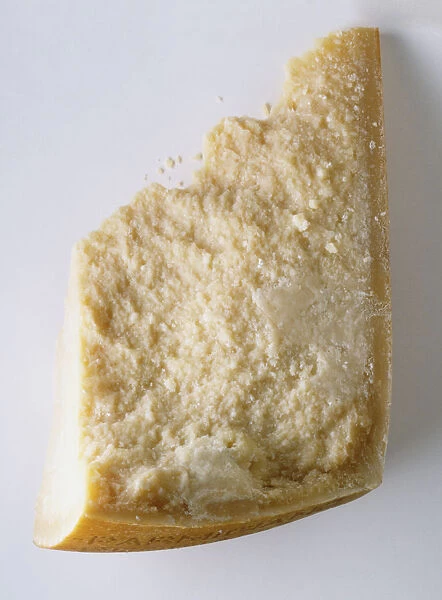 Block of Parmesan cheese, close up