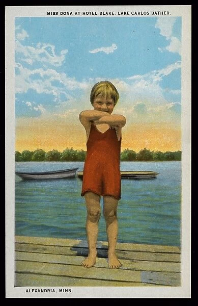 Postcard of Young Bather at Lake Carlos. ca. 1924, Young Miss Dona, with arms folded, stands wearing a bathing suit on a dock at the Hotel Blake on Lake Carlos