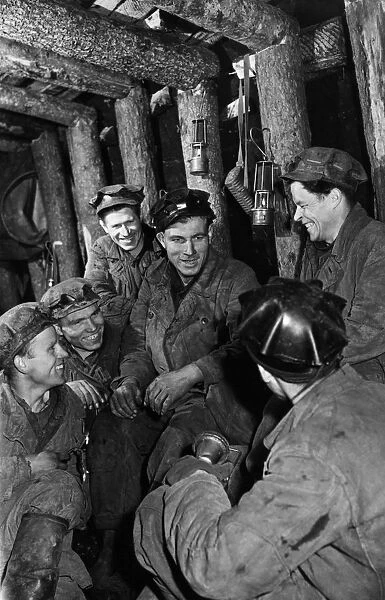 Vasili kochetov with fellow coal miners in a mine at the tula coal fields, ussr, 1930s
