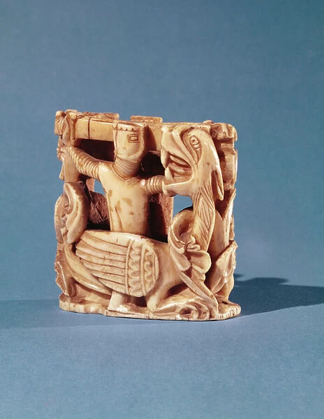 Chess piece in the form of a knight fighting a dragon (ivory)