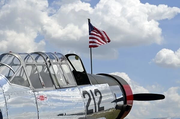 A BT-13 Valiant trainer aircraft with American Flag