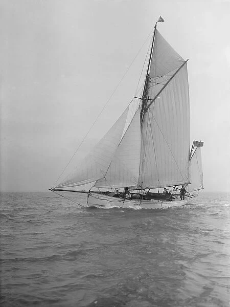 The yawl Colleen under way, 1912. Creator: Kirk & Sons of Cowes