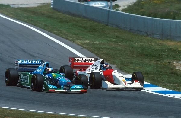 Formula One World Championship: Mika Hakkinen Mclaren MP4-9, right dives inside Michael Schumacher Benetton B194
