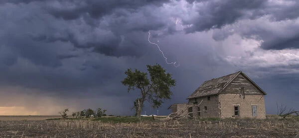Storm over abandoned farmstead