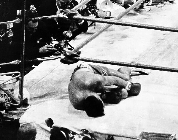 British Heavyweight Boxer Brian London lays on the canvas at Earls Court after being