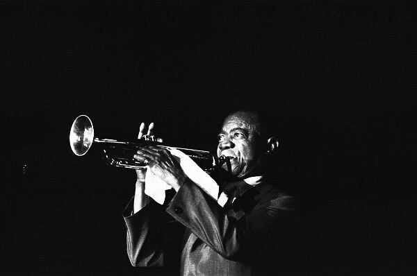 Louis Armstrong preforming on stage whilst on tour circa 1968