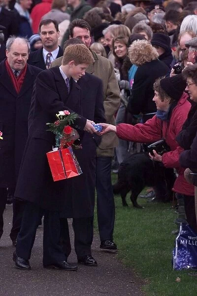 Prince Harry Sandringham Estate Christmas Day 1999 Prince Harry accepts a gift