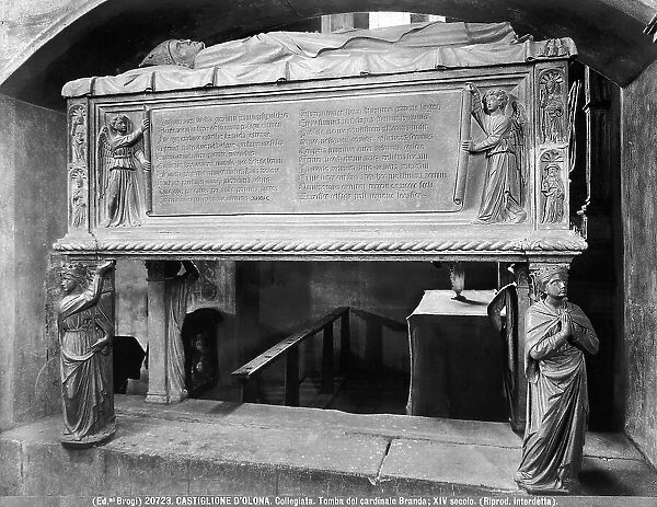 Funerary monument of the Cardinal Branda Castiglioni, stone, sculpted sarcophagus, on the long sides of which run the memorial written by Mons. Leonardo Griffi (from Varese). Collegiate Church, Castiglion Olona