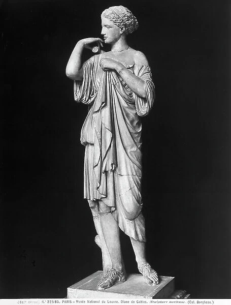 Roman copy of Diana of Gabies attributed to Praxiteles on display at the Louvre Museum, Paris
