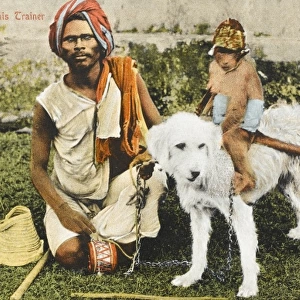 Blind Trainer with a Monkey (riding a white dog) - India