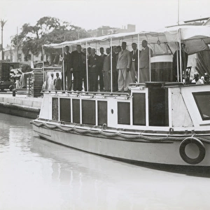 Group of people on motor boat named St. Martinus