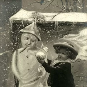 Little Girl with unusual snowman with newspaper hat and gun
