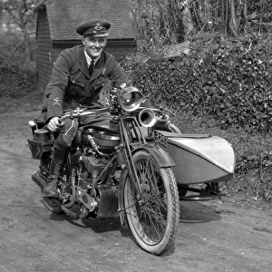 Man in RAF uniform on a motorbike