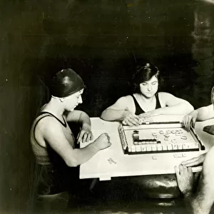 People playing Mahjong by swimming pool, USA