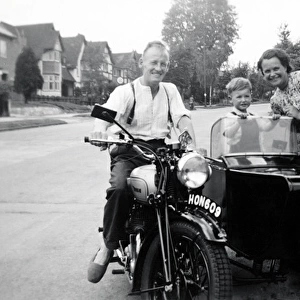 People witha 139 BSA motorcycle & sidecar
