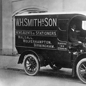 W H Smith delivery van and driver, West Midlands
