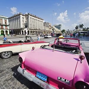 Bright pink 1950s classic American Car, Central Havana, Cuba, West Indies