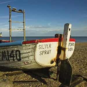 Fishing boat and nets on the seafront shingle beach of this popular unspoiled seaside town, Aldeburgh, Suffolk, England, United Kingdom, Europe